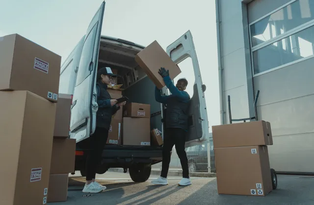 Team loading an outbound FBA shipment into a van bound for Amazon fulfillment centers